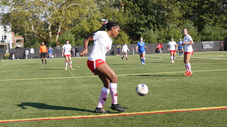 LRU Women's scoccer team playing on field