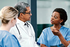 Nurses and doctor interacting