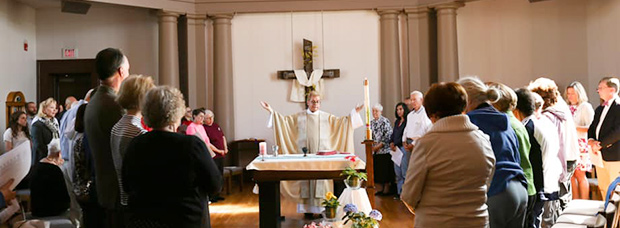 Fr. Peter Horton, University Chaplin, celebrating daily Mass in Magdalebn Chapel