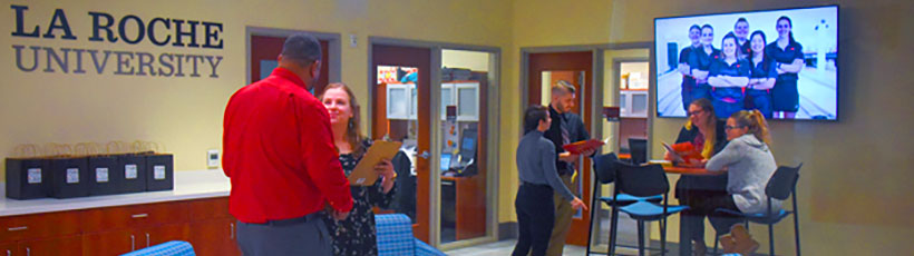 Admissions Counselors meet with prospective students in the Welcome Center.