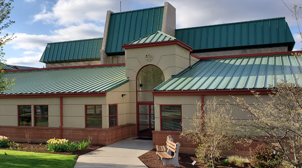 The side entrance of the Zappala Campus Center building from the outside.