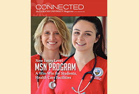 The Fall 2019/Winter 2020 cover of the La Roche magazine. There is a red Connected masthead and a photo of two La Roche University nursing students in red scrubs.