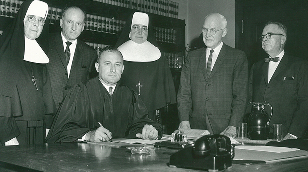 Photo of Fiounders signing the Charter establishing La Roche College.