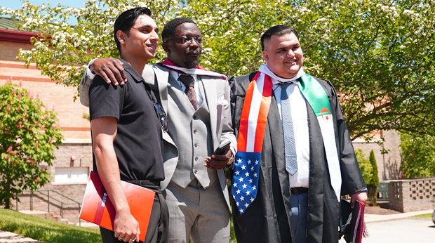 Three La Roche graduates after commencement.