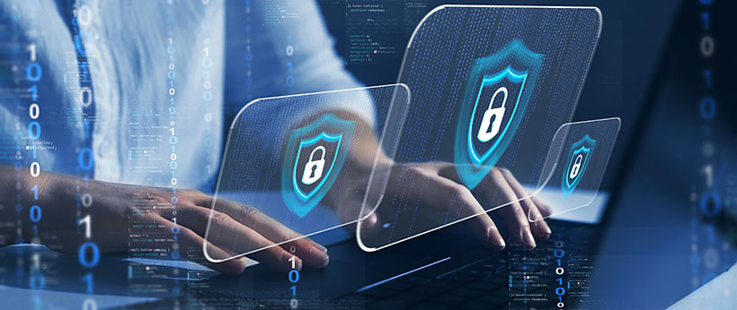 Man typing on keyboard with security symbols overlayed over image